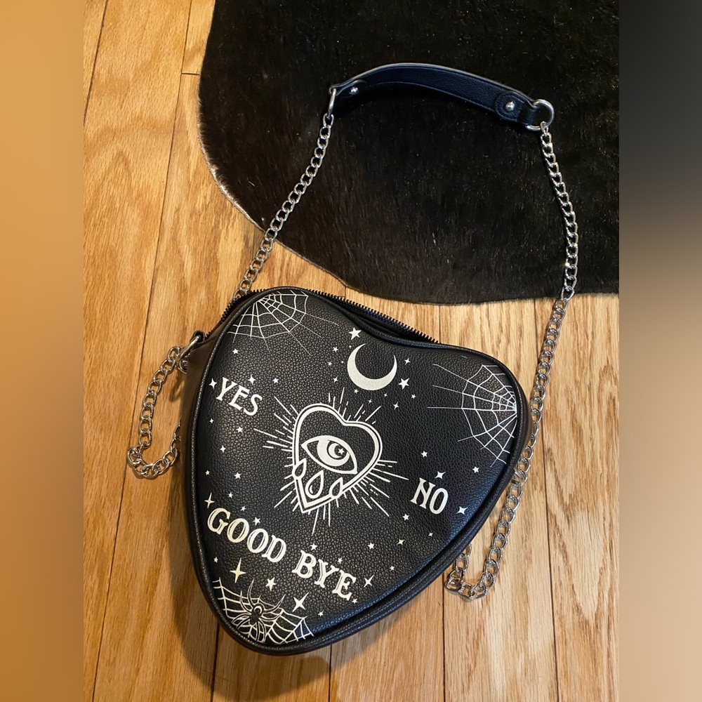 Dolls Kill Black Ouija Heart Crossbody Bag with White Graphic